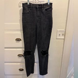 Black jeans with distressed knees.